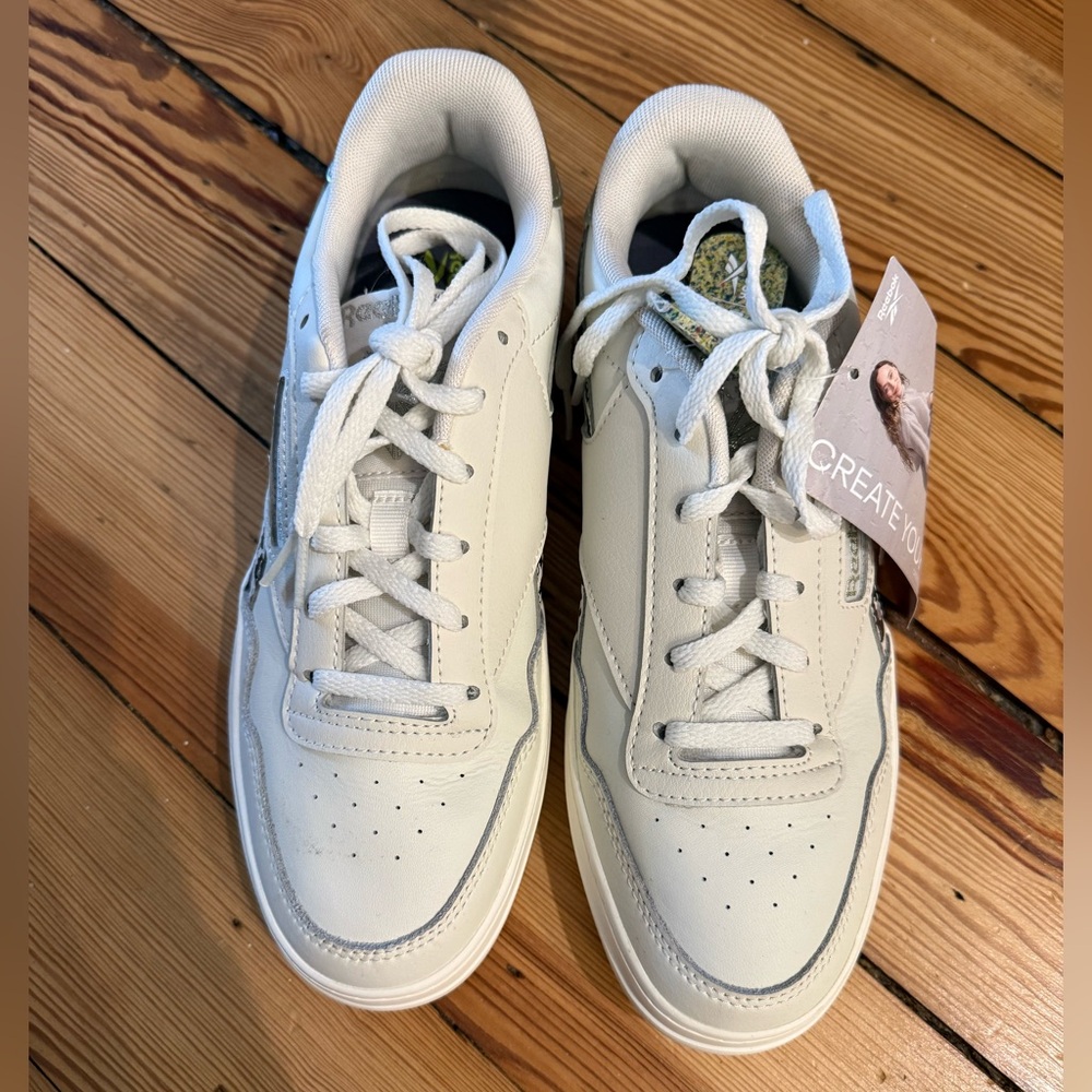 Reebok Women’s White Sneakers with Cheetah Stripe